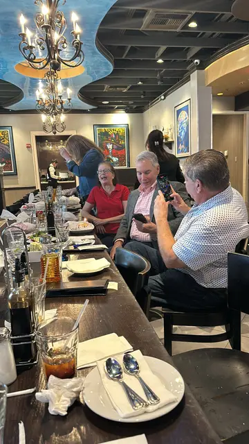Profit Inc. members at an event, January 2025