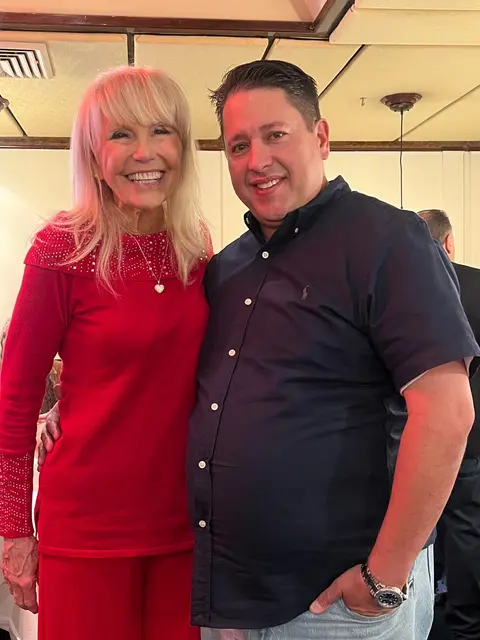 Profit Inc. members at an event, December 2024
