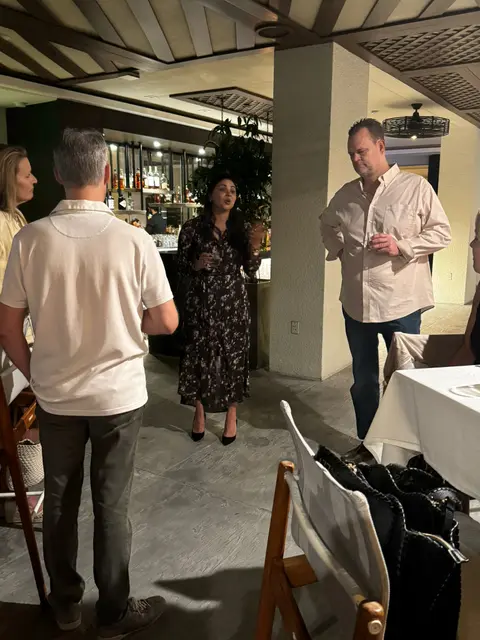 Profit Inc. members at an event, November 2024